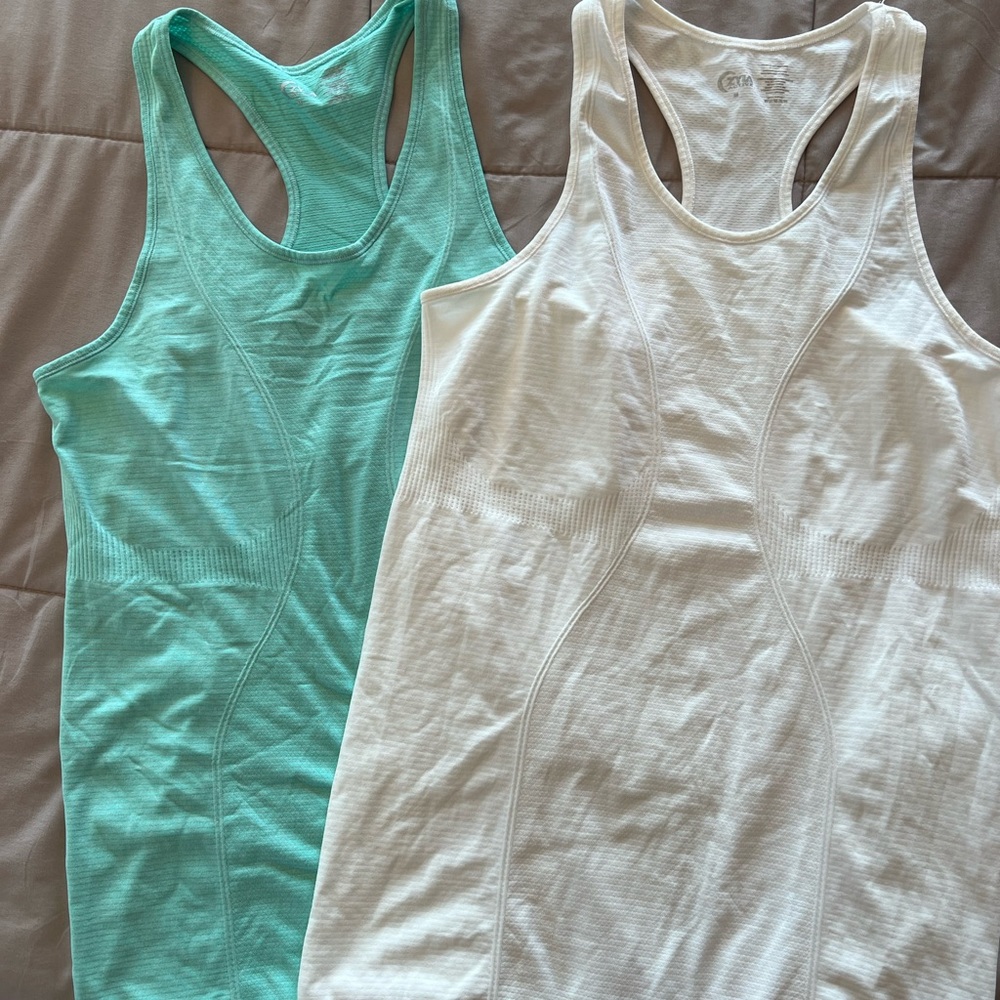 Lot of 2 Zyia Cooper Charged Tanks, size medium.